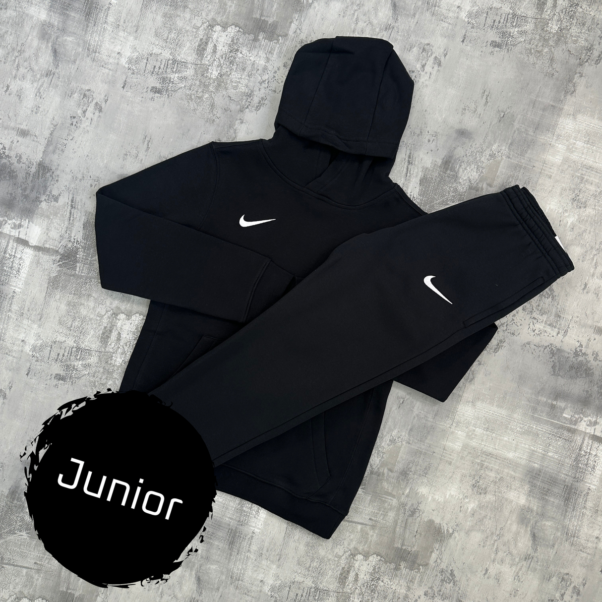 Nike tracksuit set junior shop