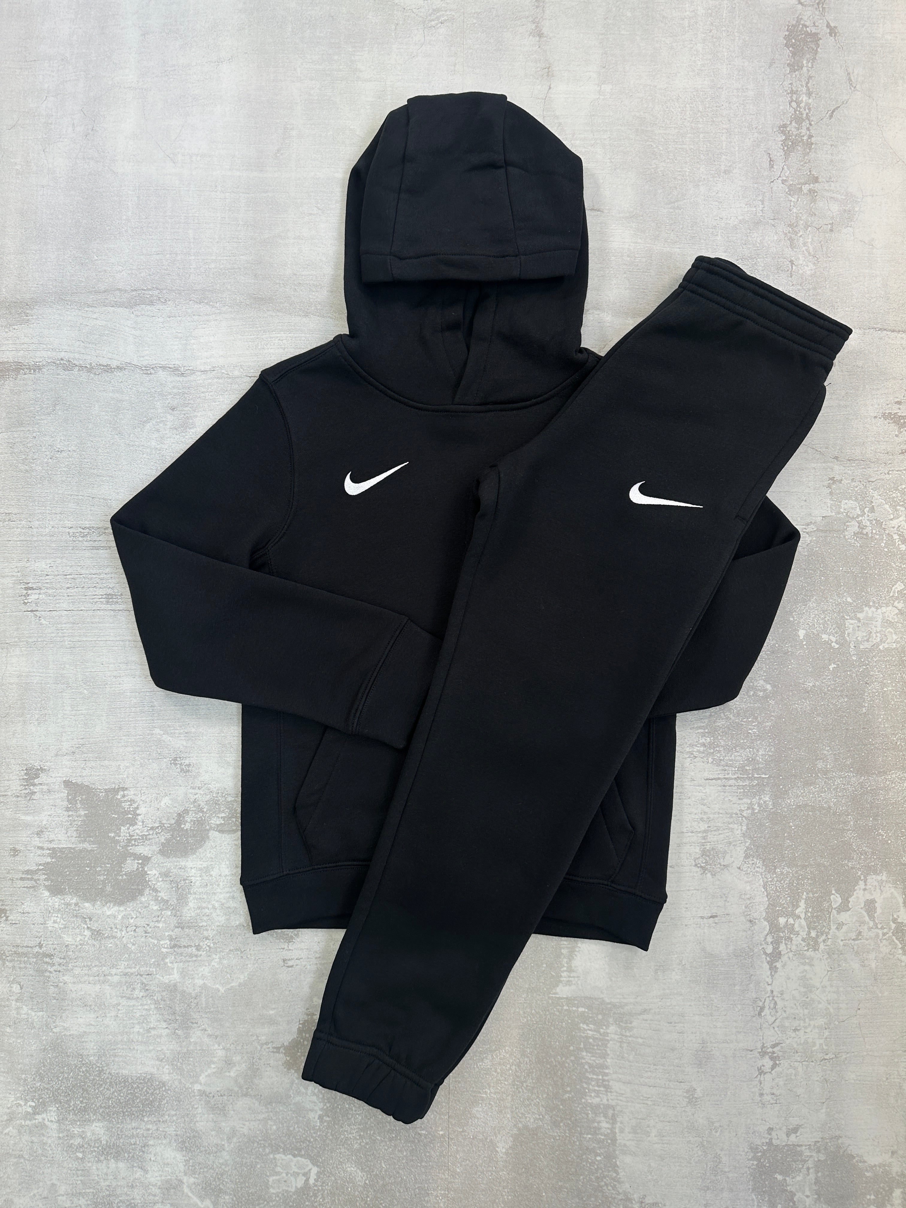 nike tracksuit top junior