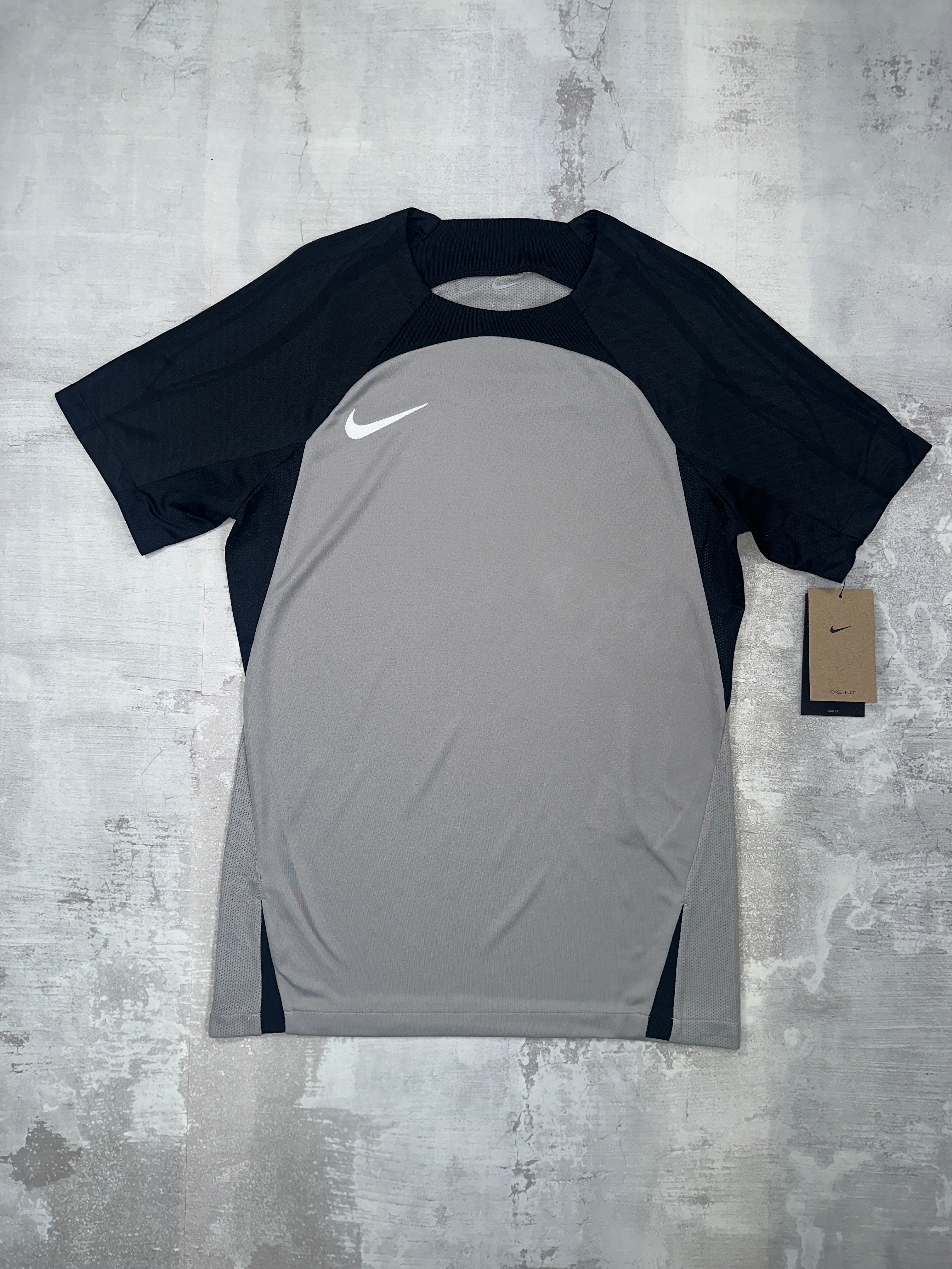 grey black and white nike shirt